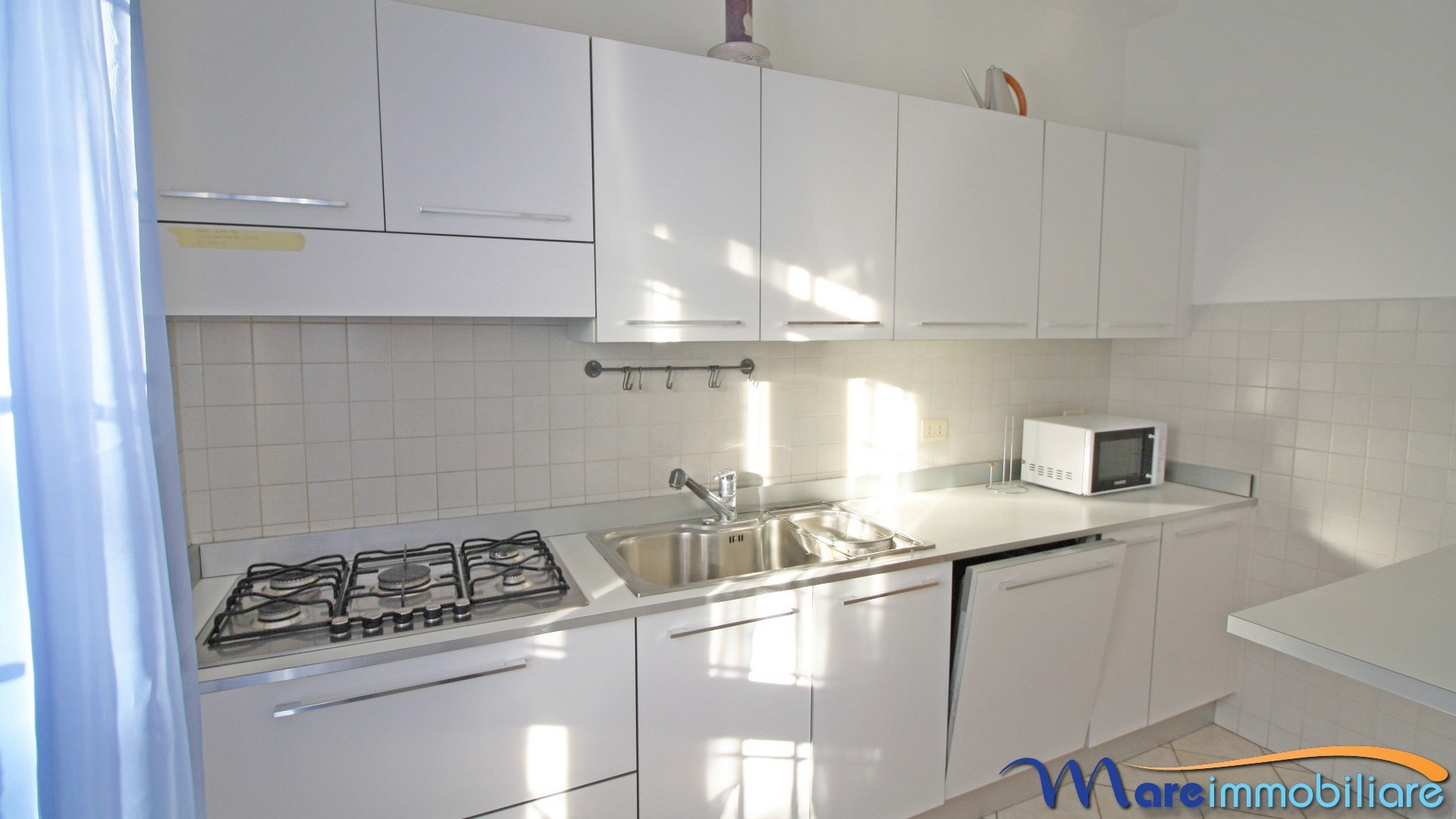 Appartamento due camere doppi servizi con giardino