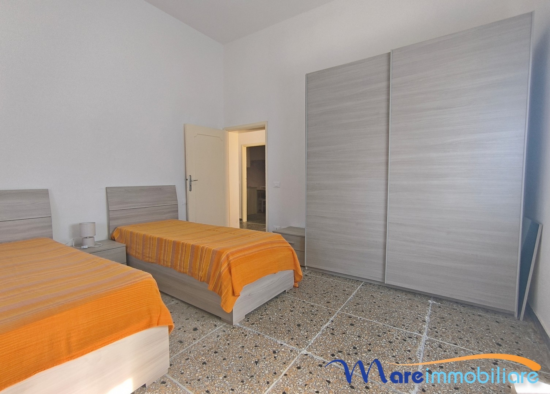 Trilocale con due camere da letto e posto auto