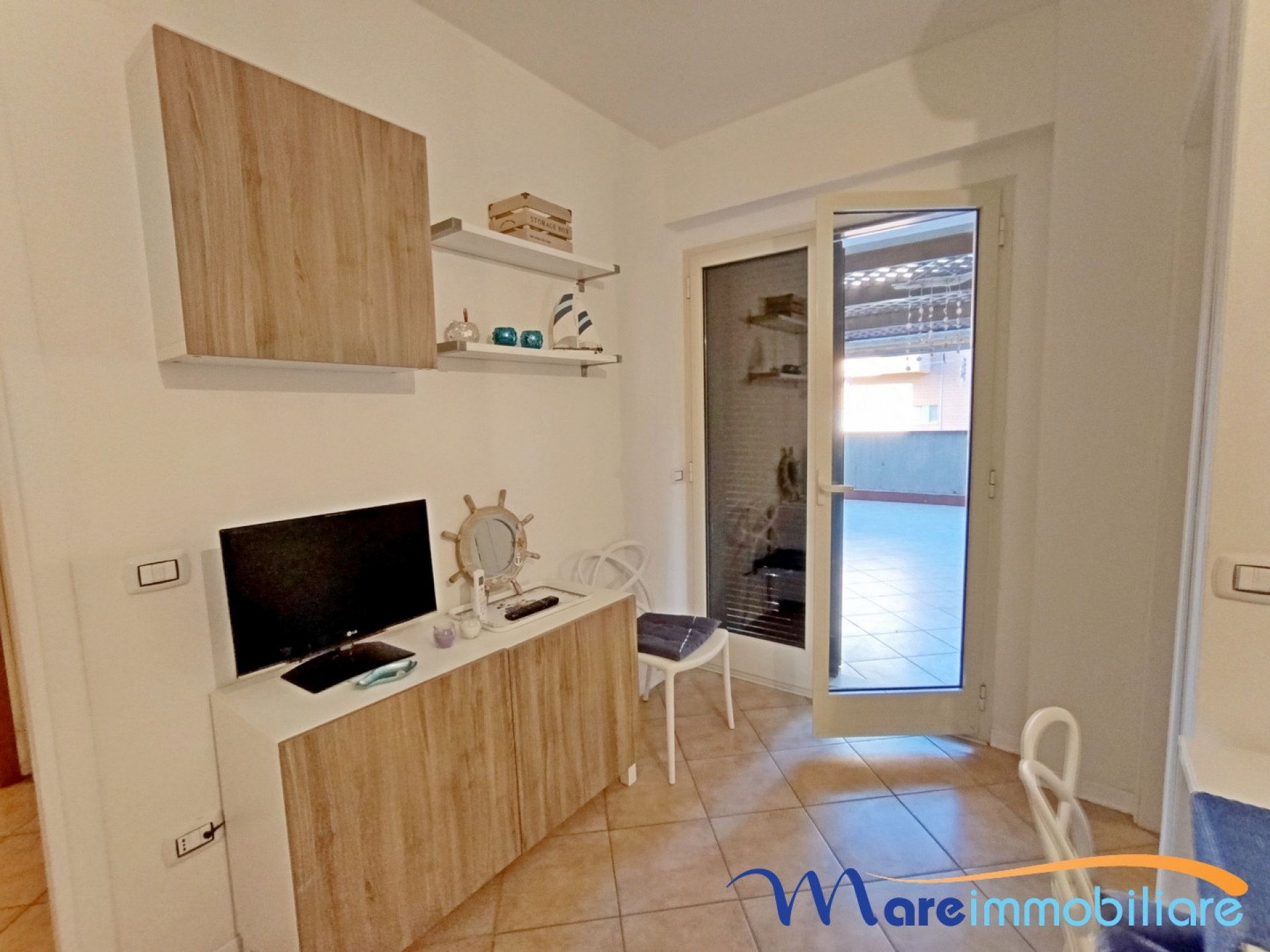 Bilocale sul corso con grande terrazza