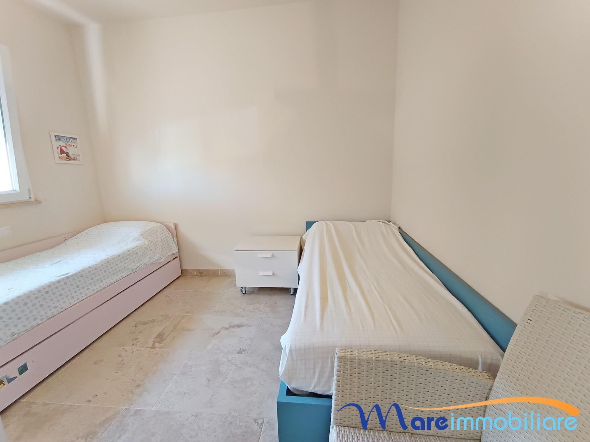 Esclusivo trilocale con doppi servizi, solarium e posto auto