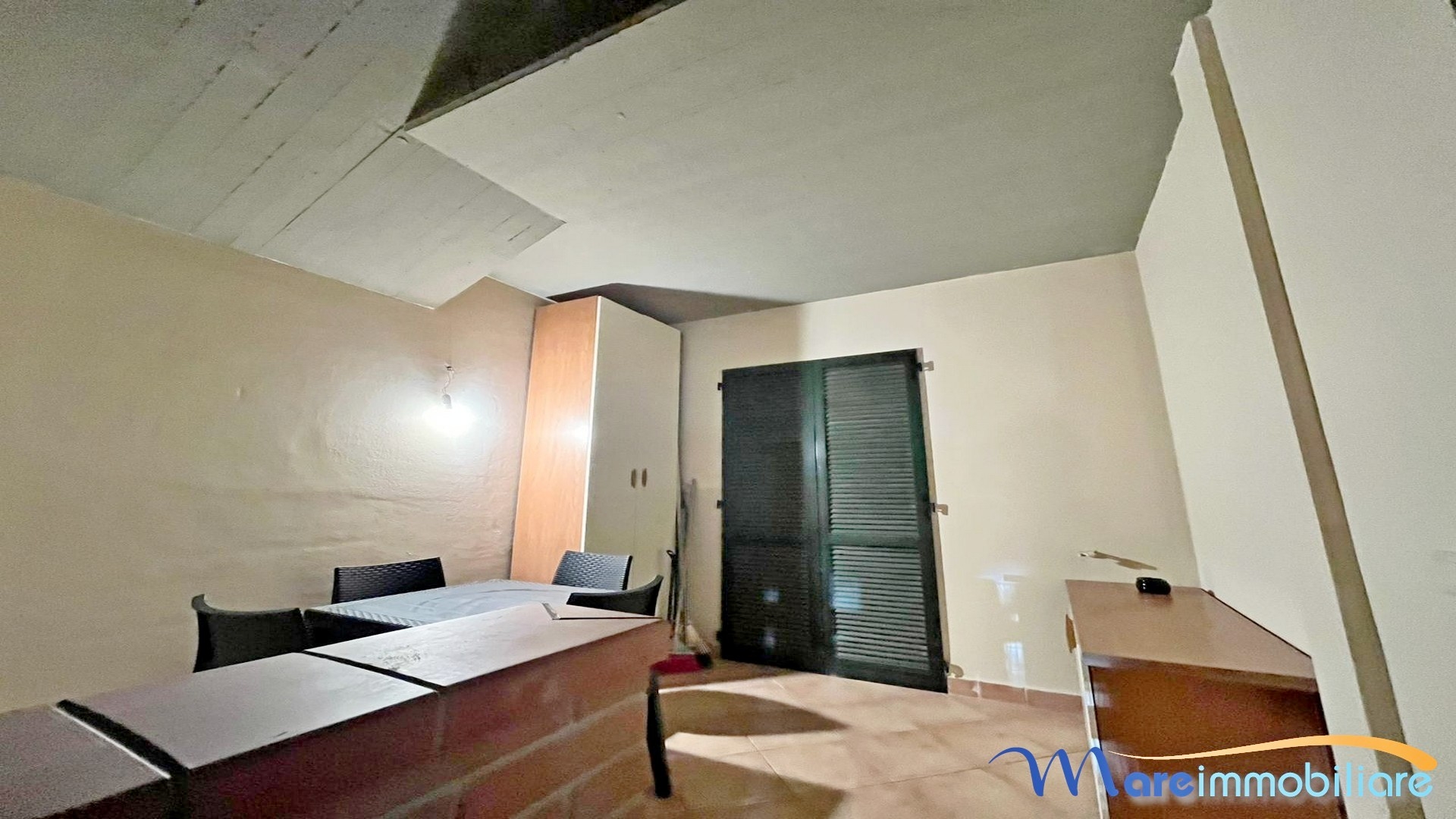 Bilocale con giardino e posto auto