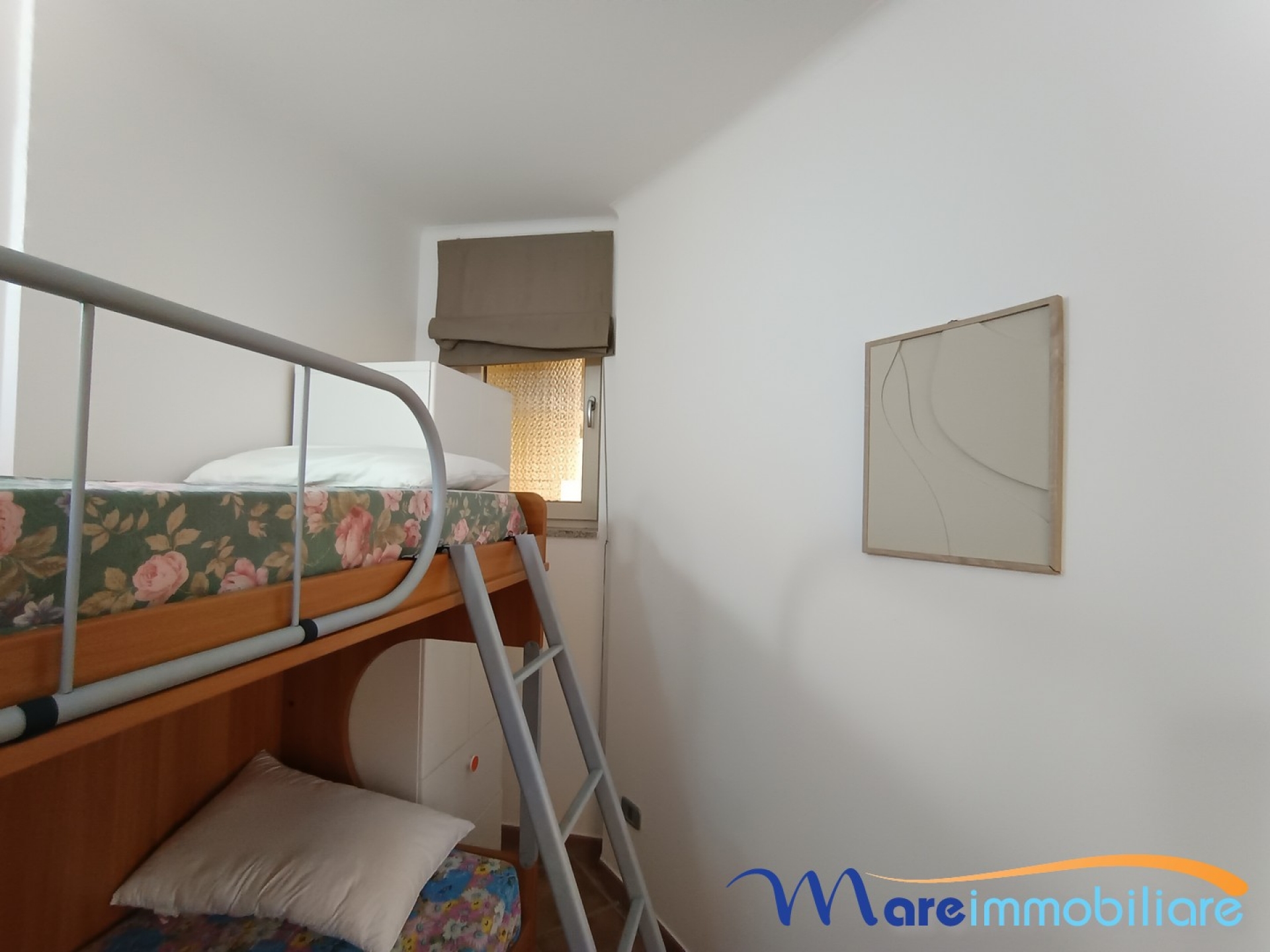 fronte mare con 2 camere e posto auto